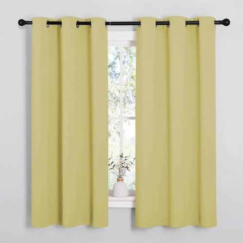 NICETOWN Blackout Window Curtain Panels - Thermal Insulated Grommet Drapes | Paler Yellow, 34x54 Inches (1 Pair)