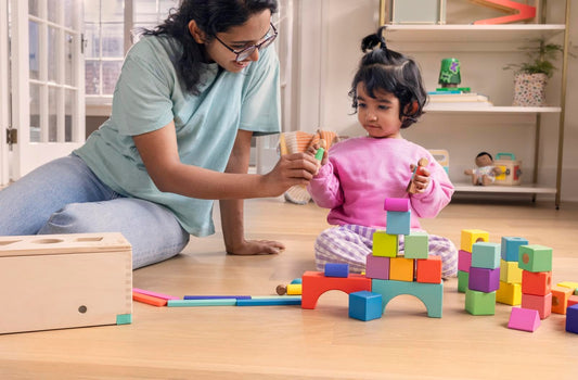 LOVEVERY | The Block Set | Solid Wood Building Blocks and Shapes + Wooden Storage Box, 70 Pieces, 18 Colors, 20+ Activities, Toddler Block Set and Converts into a Pull Car, Ages 12 to 48+ months