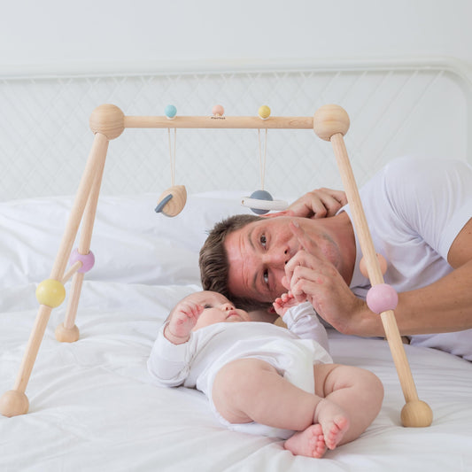 PlanToys® Play Gym Wooden Baby Activity Toy in Pastel Colours | Montessori Sensory Play for Motor Skills, Coordination & Focus | Eco-Friendly Developmental Gym