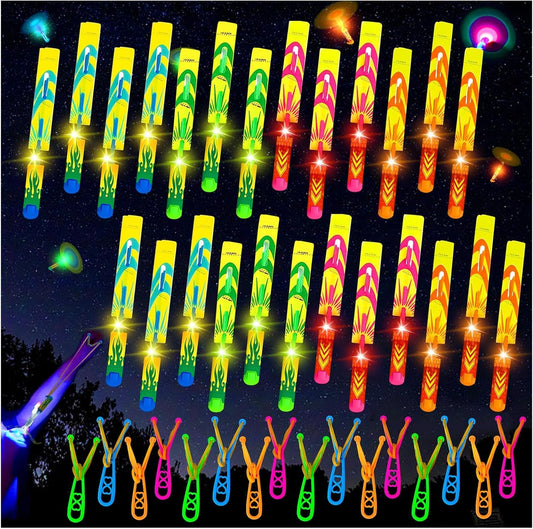 Bloolilies 50 Pcs LED Slingshot Flying Toys for Kids with 25Pcs Slingshots+25Pcs Glow Helicopters Glow in The Dark Rocket Launcher Outdoor Light Up Toys Birthday Gift Party Favors for kids 4-8 8-12
