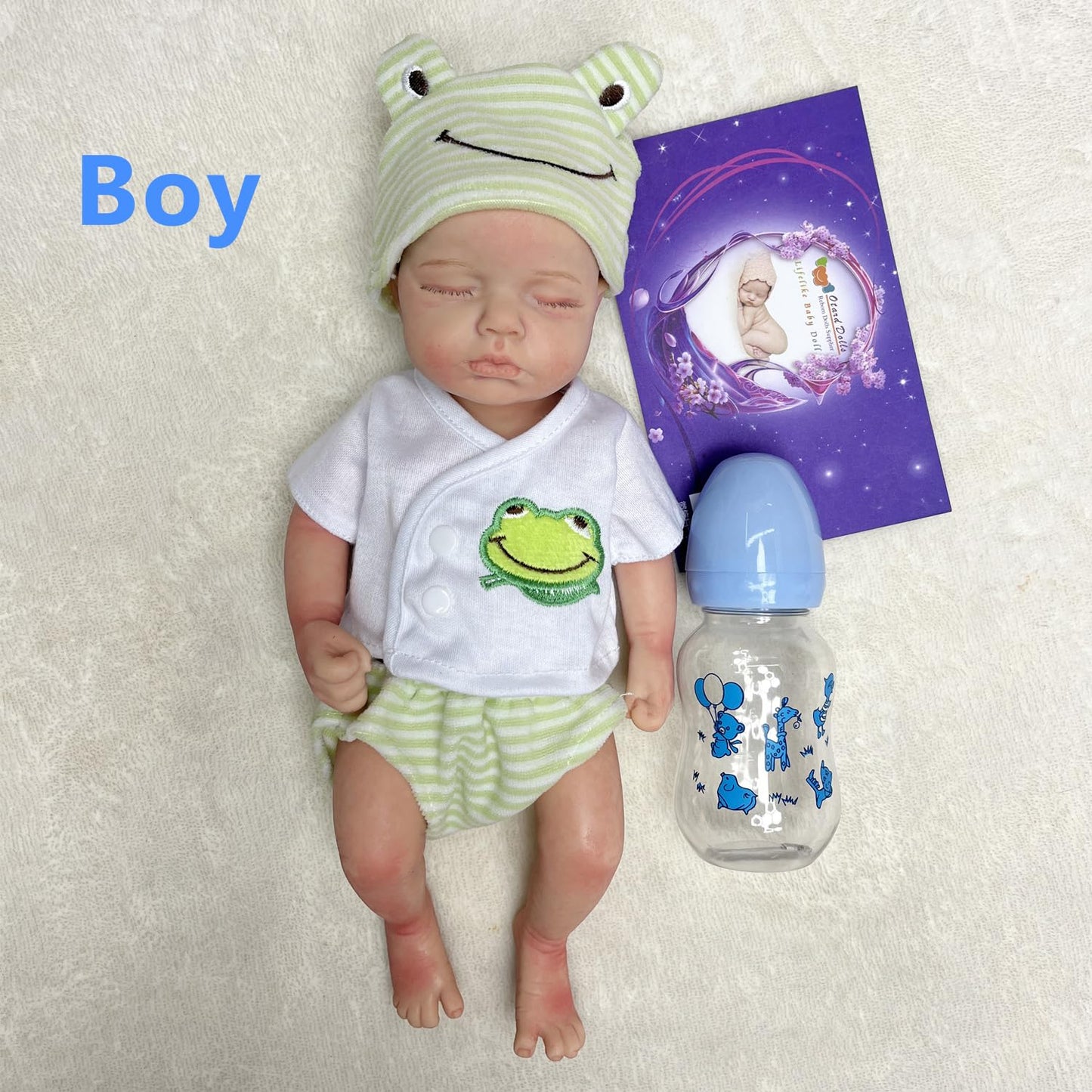 OtardDolls 12 Inch Reborn Baby Dolls Silicone Full Body Realistic Baby Doll Boy Silicone Baby Doll Handmade Painted Reborn Dolls with Clothes and Bottles Set for Kids Boys Girls